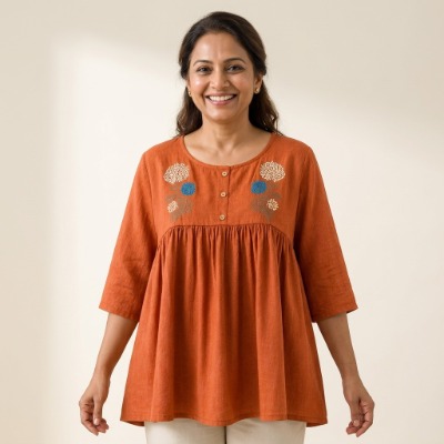 Embroidered peach tunic